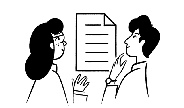 Two people discussing documents